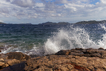 Fototapeta na wymiar Splashes of sea waves. Selective focus