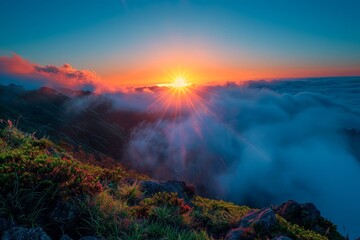 Majestic Sunrise Over Mountainous Landscape with Vibrant Sky and Clouds