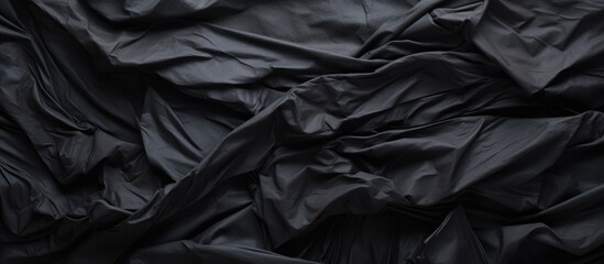 Texture of crumpled black paper - obrazy, fototapety, plakaty