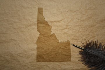map of idaho state on a old paper background with old pen