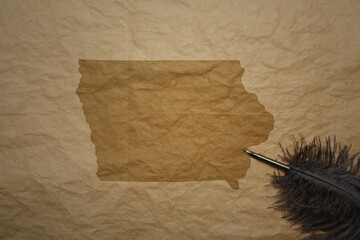 map of iowa state on a old paper background with old pen