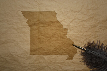 map of missouri state on a old paper background with old pen