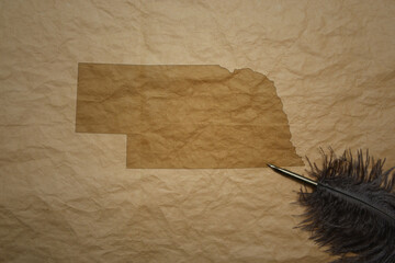 map of nebraska state on a old paper background with old pen