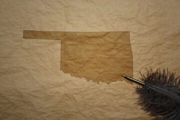 map of oklahoma state on a old paper background with old pen