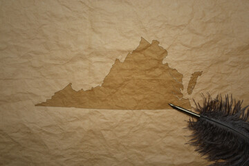 map of virginia state on a old paper background with old pen