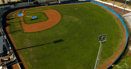 Aerial view of a baseball field. The sports center is empty and there is no one there.