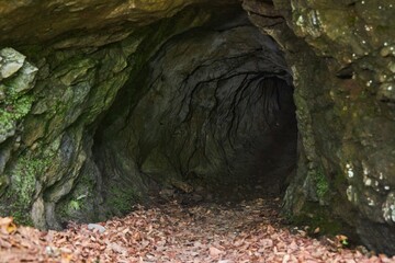 An old abandoned uranium ore mine. Industrial developments. Rock caves