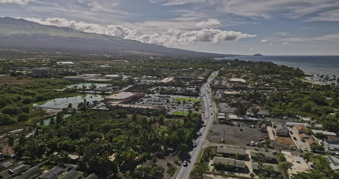 Kihei Maui Hawaii Aerial v5 drone flyover town center capturing local community businesses, Laie wetland restoration site and ocean landscape views in summer - Shot with Mavic 3 Cine - December 2022