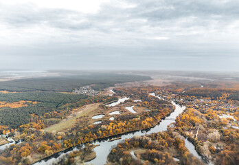 Autumn aerial of colorful golden river scenery