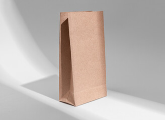 Kraft paper bag mockup. Eco beige pouch, package, vertical packet © valiantsin