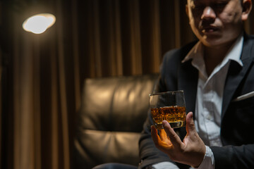 Businessmen in suits drinking  Celebrate whiskey.