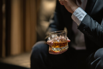 Businessmen in suits drinking  Celebrate whiskey.