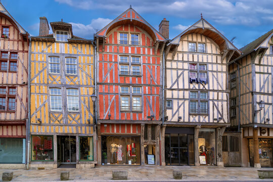 Historic colorful half-timbered houses on a medieval street in Troyes, Champagne, France
