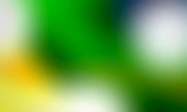Abstract blurred background image of green, yellow colors gradient used as an illustration. Designing posters or advertisements.