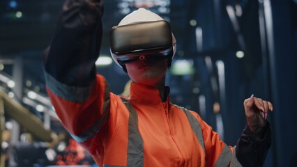 Factory technician wearing virtual reality goggle in production facility closeup