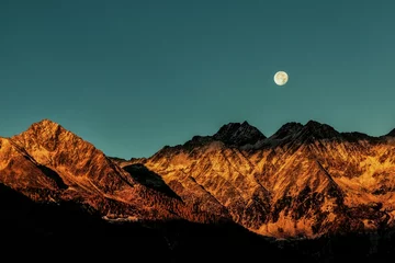 Selbstklebende Fototapeten moon in the mountain © BusImages