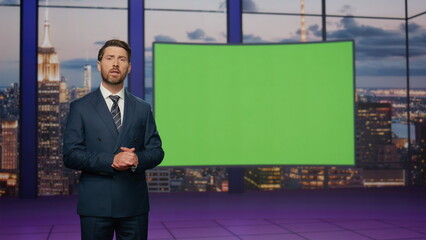 Broadcast presenter reporting daily news at television channel with green screen