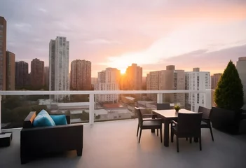 Papier Peint photo Lavable Etats Unis Sunset view from a high-rise balcony with two outdoor sofas and a city skyline in the background 