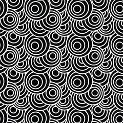 Black and white 3d overlapping circle pattern.