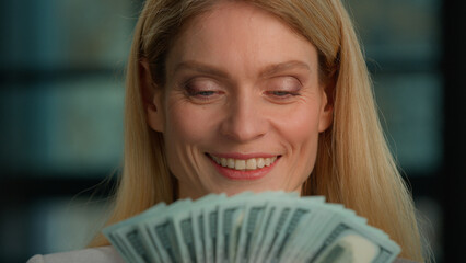 Close up head shot Caucasian 40s woman middle-aged adult businesswoman rich female holding fan...