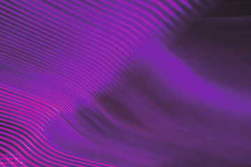 Neon pink and purple light trails form a motion blurred wave effect