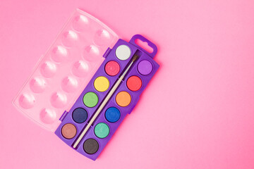 New Watercolor Paint Set in Purple Box on Pink Background