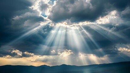 Rays of light shining through dark clouds It's gonna rain, dramatic sky with cloud, Sky background on sunrise nature composition The beam of light through the dark clouds on the mountains. - 753602214