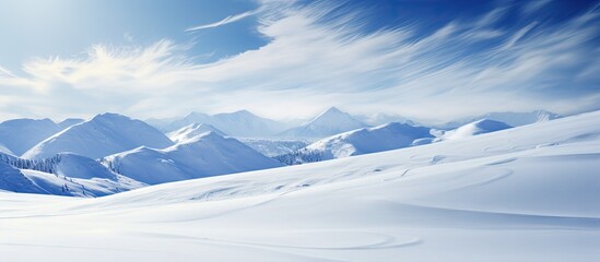 Majestic Mountain Range in Serene Landscape at Sunrise with Clear Blue Skies