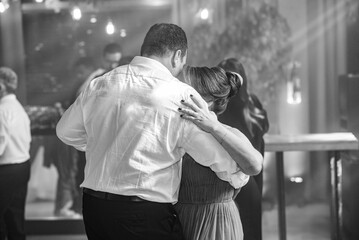 couple dancing, couple on the dance floor, night party, black and white image, dance floor


