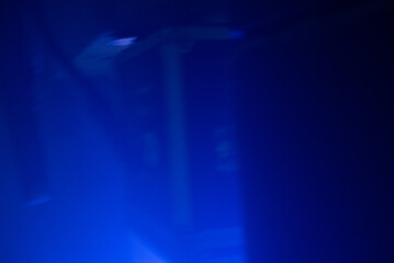 loop of blue lights, spotlights on stage, light background, blue background