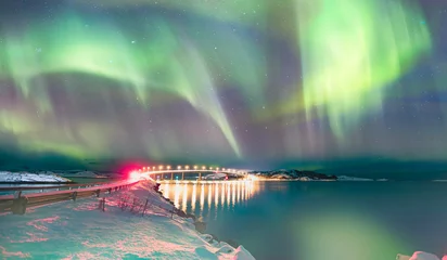 Tuinposter Sommaroy Bridge is a cantilever bridge connecting the islands of Kvaloya and Sommaroy with Aurora Borealis - Hillesoy Tromso Norway © muratart