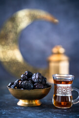 Ramadan festival Iftar food image dates with black tea 