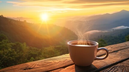 Close-up view of a cup of coffee on table with sunrise over mountain ridge with fog. - obrazy, fototapety, plakaty