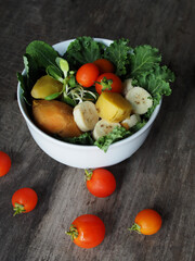 colorful vegetable salad on wood table healthy food clean organic fresh