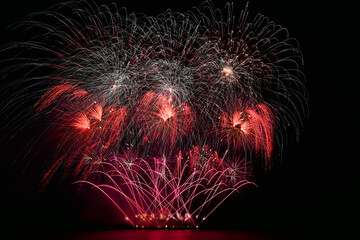 colourful firework display set for celebration happy new year and merry christmas and  fireworks on black background - 753640233