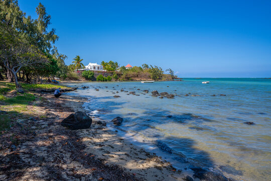 View of Anse La Raie Beach and turquoise Indian Ocean on sunny day, Mauritius