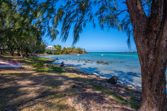 View of Anse La Raie Beach and turquoise Indian Ocean on sunny day, Mauritius