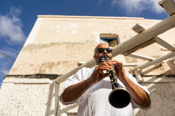 Musician Playing Clarinet Outdoors for Jazz International Day