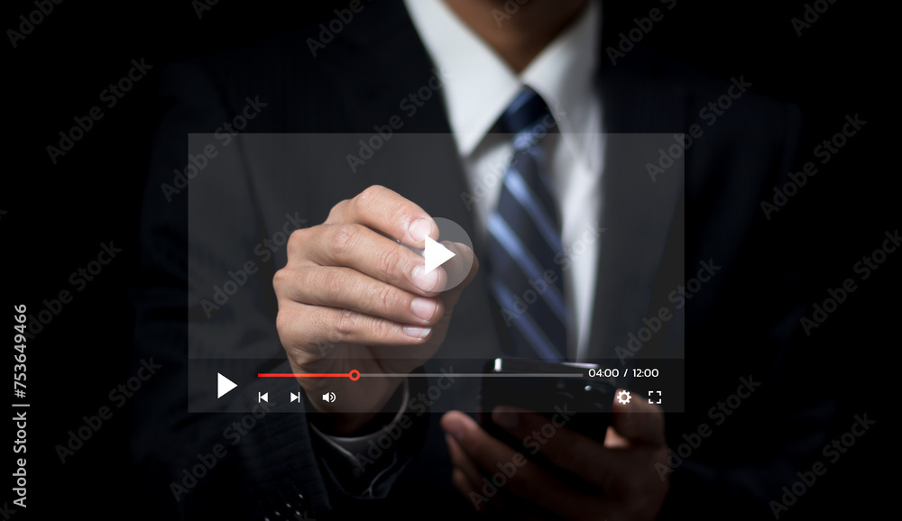 Poster man using pressing the play button to start online entertainment for an online video-on-demand strea
