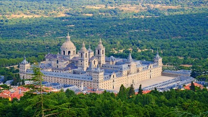 Escorial monastery from Abantos between pine forests sunset architecture Madrid tourism
