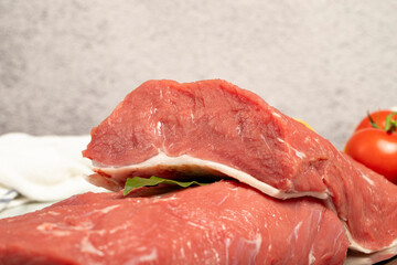 Beef sirloin. Butcher products. Raw beef sirloin or steak on a stone background