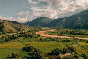 Fototapeta premium Rio Grande river on the colourful valley of Quebrada de Humahuaca in Jujuy