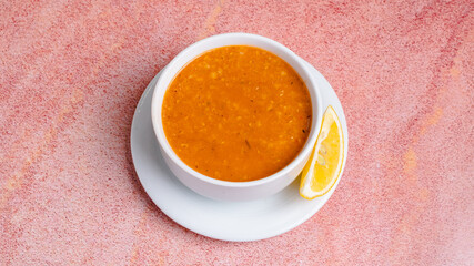 Lentil soup bowl with lemon