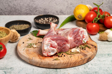 Lamb's shank. Butcher products. Lamb shank steak with bones on stone background