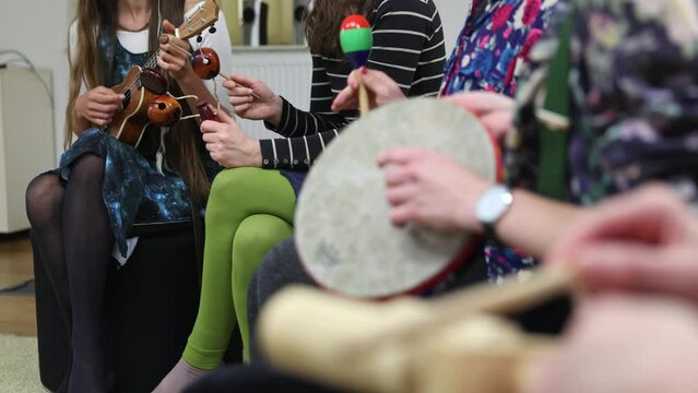 Music therapy concept, a group of people playing different types of musical instruments, music and sound healing