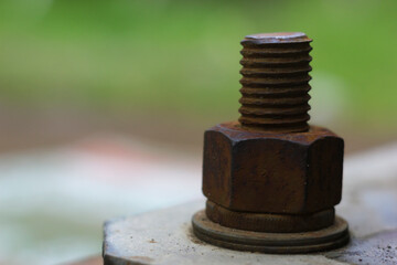 Close up of rusty nut and bolt, bokeh 