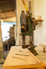 man working in a carpentry shop. Photographs of the work and backgrounds for publications with copy space.