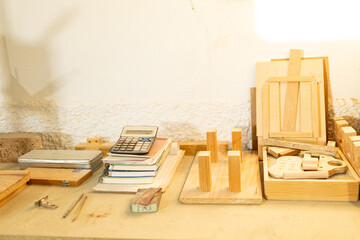 man working in a carpentry shop. Photographs of the work and backgrounds for publications with copy space.