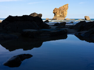 Aguilar beach betwen Cudillero and Muros de Nalon at sunset in Asturias, Spain