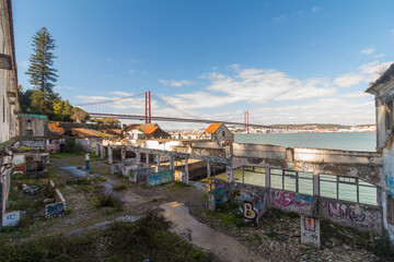 25 of April Bridge over the Tagus river in Lisbon Portugal with abandoned scenery. 19 February 2019.